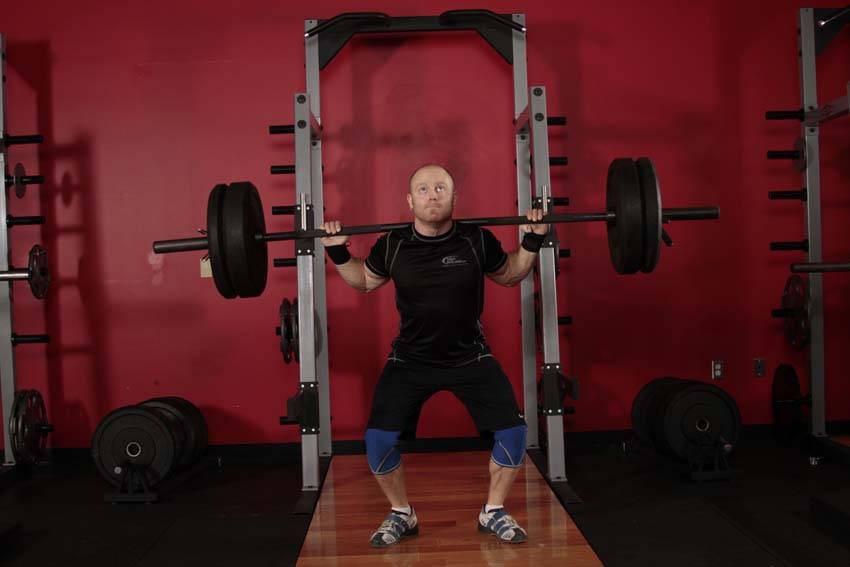 Behind the Neck Shoulder Press: Ending position