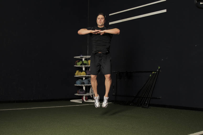 Knee Tucks: Ending position